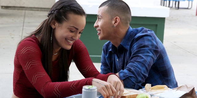 Alexandra Rodriguez and Carlito Olivero on the set of East Los High 3.