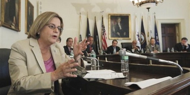 In this May 19, 2010, file photo, Rep. Ileana Ros-Lehtinen, left, gestures during a meeting on Capitol Hill.