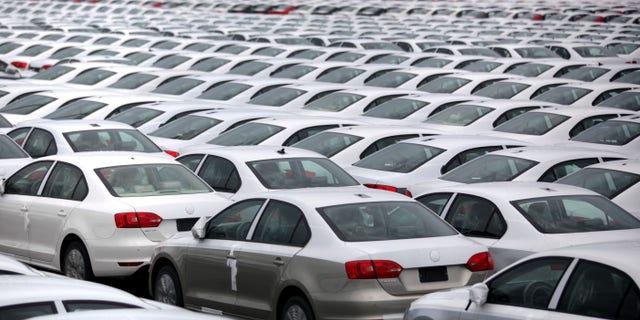 FILE - In this Sept. 19, 2013 file photo, Volkswagen Jettas produced in Mexico for export are parked at the port terminal in the Gulf city of Veracruz, Mexico. Mexico is on track to replace Japan as the second-largest exporter of cars to the United States by the end of 2014, and is expected to surpass Canada for the top spot by the end of 2015. (AP Photo/Felix Marquez, File)