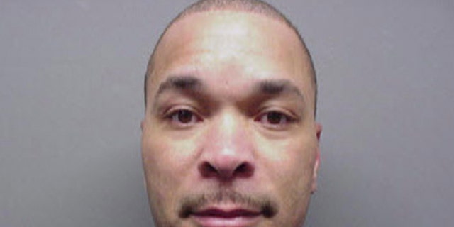 In this undated photo released by the Michigan Department of Corrections, Gregory Green is shown. The bodies of two young children and two teenagers were found at a Dearborn Heights, Mich., home early Wednesday, Sept. 21, 2016 after Green called 911 to report that he had killed them, police said. Two girls, ages 4 and 5, were asphyxiated in a car using exhaust, while a 17-year-old girl and a 19-year-old male were fatally shot. Green's wife was shot and stabbed but is in stable condition and is expected to survive. Green, 49, is in custody. Green had served 16 years in prison for second-degree murder — the fatal stabbing of his pregnant wife in 1991, records show. (Michigan Department of Corrections)