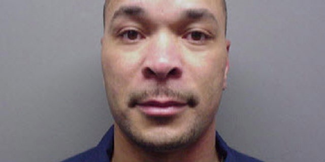 In this undated photo released by the Michigan Department of Corrections, Gregory Green is shown. The bodies of two young children and two teenagers were found at a Dearborn Heights, Mich., home early Wednesday, Sept. 21, 2016 after Green called 911 to report that he had killed them, police said. Two girls, ages 4 and 5, were asphyxiated in a car using exhaust, while a 17-year-old girl and a 19-year-old male were fatally shot. Green's wife was shot and stabbed but is in stable condition and is expected to survive. Green, 49, is in custody. Green had served 16 years in prison for second-degree murder — the fatal stabbing of his pregnant wife in 1991, records show. (Michigan Department of Corrections)
