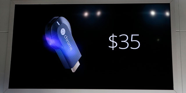 File photo: The new Google Chromecast dongle is pictured on an electronic screen as it is announced during a Google event at Dogpatch Studio in San Francisco, California, July 24, 2013. (REUTERS/Beck Diefenbach)