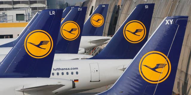 FILE - In this April 2, 2014 file picture Lufthansa aircrafts are parked as Lufthansa pilots went on a three-days-strike in Frankfurt, Germany. A union representing pilots at Lufthansa says they will stage a six-hour strike Friday  targeting short- and medium-haul flights from Frankfurt.The Vereinigung Cockpit union said Thursday Sept. 4, 2014  the strike will run from 5 p.m. to 11 p.m. (1500 to 2100 GMT; 11 a.m. to 5 p.m. EDT).   (AP Photo/Michael Probst,File)