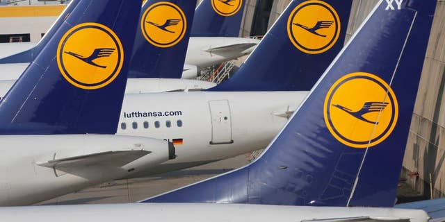 FILE - In this April 2, 2014 file picture Lufthansa aircrafts are parked as Lufthansa pilots went on a three-days-strike in Frankfurt, Germany. A union representing pilots at Lufthansa says they will stage a six-hour strike Friday targeting short- and medium-haul flights from Frankfurt.The Vereinigung Cockpit union said Thursday Sept. 4, 2014 the strike will run from 5 p.m. to 11 p.m. (1500 to 2100 GMT; 11 a.m. to 5 p.m. EDT). (AP Photo/Michael Probst,File)