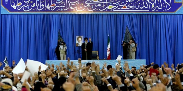 In this photo released by an official website of the Iranian supreme leader's office on Thursday, March 21, 2013, Iran's Supreme Leader Ayatollah Ali Khamenei waves to a crowd in northeastern Iran on the first day of the new Persian calendar year.
