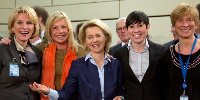 From left, defense ministers, Albania's Mimi Kodheli, Netherland's Jeanine Hennis-Plasschaert, Germany's Ursula von der Leyen, Norway's Ine Marie Eriksen Soreide and Italy's Roberta Pinotti pose for photographers prior to the start of a meeting of defense ministers of the North Atlantic Council at NATO headquarters in Brussels on Wednesday, Feb. 26, 2014. Frustrated with his Afghan counterpart, U.S. President Barack Obama is ordering the Pentagon to accelerate planning for a full U.S. troop withdrawal from Afghanistan by the end of this year. But Obama is also holding out hope that Afghanistan's next president may eventually sign a stalled security agreement that could prevent the U.S. from having to take that step. (AP Photo/Virginia Mayo)