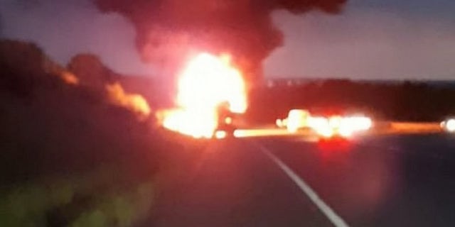 A transporter carrying a dozen novelty cars including a BATMOBILE caught fire - burning a number of vintage vehicle to bits. See SWNS story SWFIRE; The lorry was travelling westbound on the M4 near Bath on Wednesday night when it went up in flames. Highways England was forced to shut two lanes of the motorway as firefighters battled the blaze into the early hours of Thursday. It is not know the extent of damage the cars suffered, but Highways England said a number of the specialists cars along with the transporter cab had been destroyed. The truck had been transporting a number of classic cars including a âDukes of Hazzardâ General Lee, Batmobile, âTransformersâ Ford Mustang and âStarsky and Hutchâ Ford Torino.