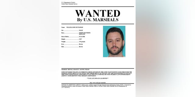 A wanted poster for Cody Wilson.