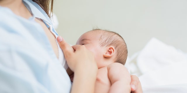 A mom is shown nursing her newborn baby. New guidelines on breastfeeding from the American Academy of Pediatricians that extend the recommended time period for nursing are sparking discussion among moms and families. 