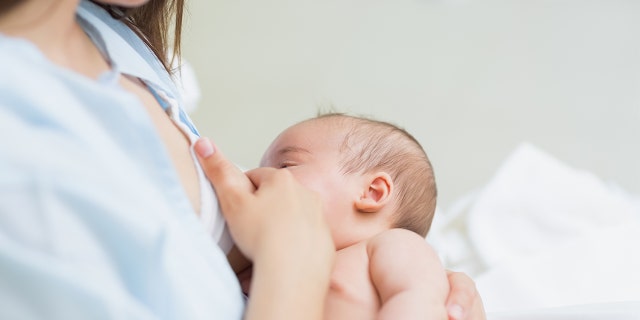 A mom is shown nursing her newborn baby. New guidelines on breastfeeding from the American Academy of Pediatricians that extend the recommended time period for nursing are sparking discussion among moms and families.