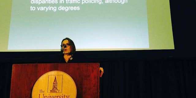 University of Vermont professor Stephanie Seguino addresses an audience Monday, Jan. 9, 2017, in Burlington, Vt., while discussing the findings of a study that has found racial disparities in how police treat drivers in the state. The study looked at 2015 traffic stop data from 29 police departments around Vermont. Among the findings, black drivers were four times more likely than whites to be searched after traffic stops, and Hispanic drivers were nearly three times more likely. (AP Photo/Lisa Rathke)