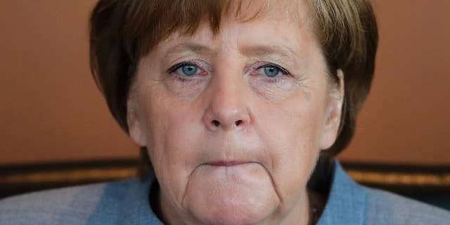 German Chancellor Angela Merkel attends the weekly cabinet meeting of the German government at the chancellery in Berlin, Germany, Wednesday, April 26, 2017. (AP Photo/Markus Schreiber)