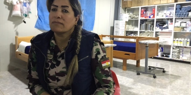 Nurse Khansa Ali in her clinic before Turkey destroyed it.