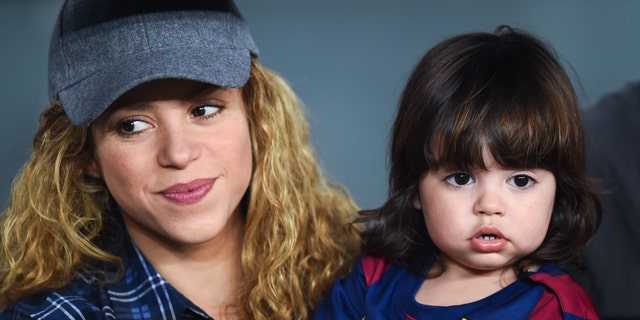 BARCELONA, SPAIN - OCTOBER 18: Shakira and her son Milan look on during the La Liga match between FC Barcelona and SD Eibar at Camp Nou on October 18, 2014 in Barcelona, Spain. (Photo by David Ramos/Getty Images)