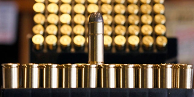 .38 caliber ammunition is seen at Jim Newbauer's gun shop in Tombstone, Arizona May 14, 2008. Newbauer has raised the price of a box of the rounds from seven dollars to $17 in two years due to the increase he has had to pay. Millions of shooters, hunters and even lawmen across the United States feeling the pinch as sky-high metals prices and demand from wars abroad are driving up the price of bullets.  To match feature METALS-USA/AMMO      REUTERS/Jeff Topping (UNITED STATES)