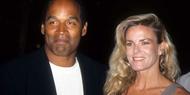 Former NFL star O.J. Simpson was charged with murdering wife Nicole Brown Simpson and her friend, Ron Goldman, but was later acquitted. O.J. and Nicole are pictured in 1994.
