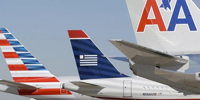 US Airways and American Airlines planes at Dallas/Fort Worth International Airport.