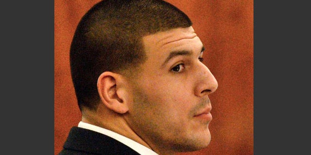 Jan. 30, 2015: Former New England Patriots football player Aaron Hernandez listens to testimony during his murder trial in Fall River, Mass.