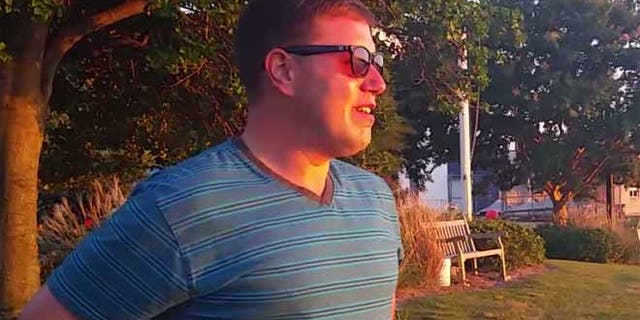Aaron Williams-Mele is pictured seeing the sunset in color for the first time.