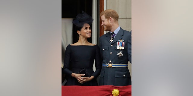 Meghan the Duchess of Sussex was all smiles through her second appearance on the balcony of Buckingham Palace.