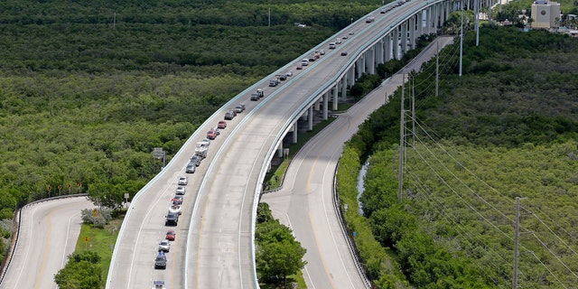 Motorists head north on US 1, Wednesday, Sept. 6, 2017, north of Key Largo, Fla.