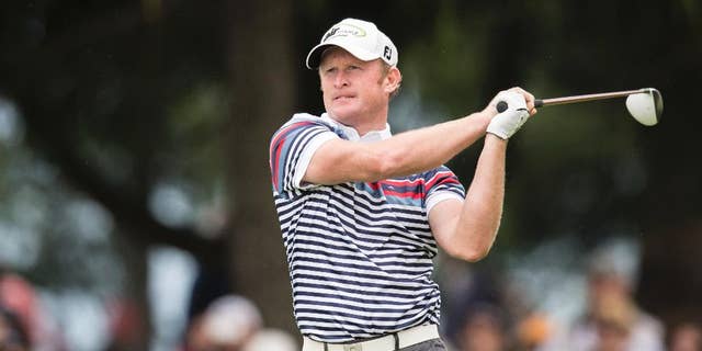 Jamie Donaldson of Wales tees off at hole 9 during the second round of the Omega European Masters Golf Tournament in Crans-Montana, Switzerland, Friday, September 5, 2014. (AP Photo/Keystone/Ennio Leanza)