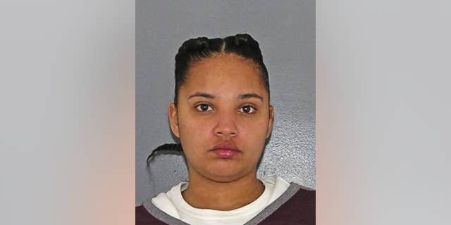 This undated photo provided by the Hamilton County Sheriff's Office in Cincinnati shows Briana Benson indicted Monday, April 10, 2017, on charges that included murder, felonious assault, aggravated vehicular homicide and failure to stop after a crash. Benson, accused of intentionally hitting a woman with her car and dragging her during an argument, is scheduled to appear in court on Thursday, April 13. (Hamilton County Sheriff's Office via AP)