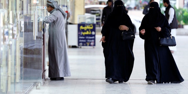 A top cleric in Saudi Arabia said Friday that women should not be forced to wear long black robes any longer.