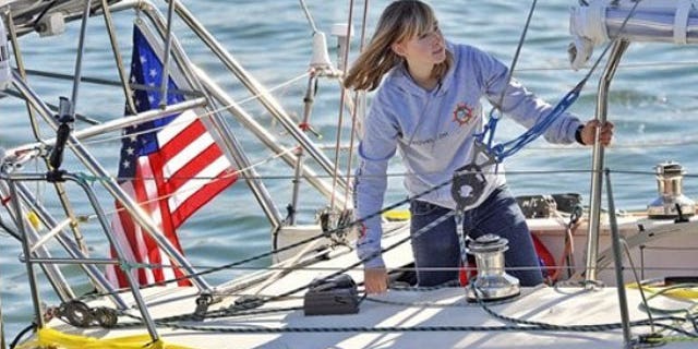 Abby Sunderland, 16, looks out from her sailboat, Wild Eyes, as she leaves for her world record attempting journey at the Del Rey Yacht Club in Marina del Rey, Calif. (AP)