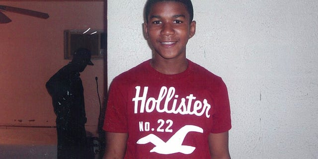 In this undated file family photo, Trayvon Martin poses for a family photo.