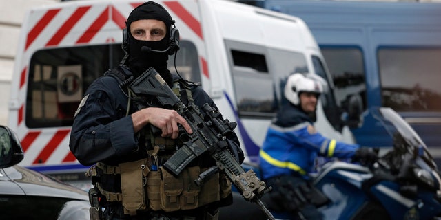 May 20, 2016: Members of French military task force GIGN secure the convoy transporting Paris attacks suspect, Salah Abdeslam as they leave the Paris courthouse.