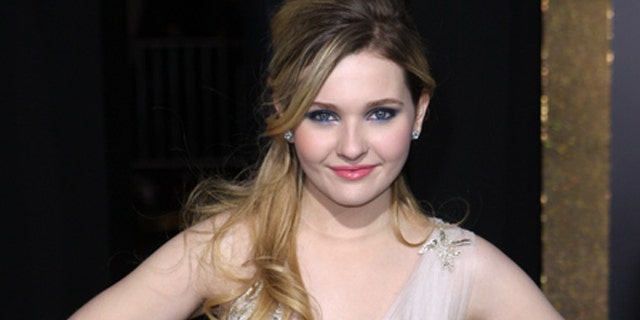 Abigail Breslin arrives to the Premiere Of Warner Bros. Pictures' 'New Year's Eve' at Grauman's Chinese Theatre on December 5, 2011 in Hollywood, California X17online.com