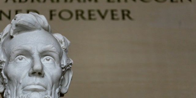 File photo - Former U.S. President Abraham Lincoln's statue at the Lincoln Memorial is seen in Washington March 27, 2015. (REUTERS/Gary Cameron)