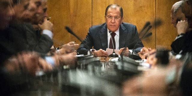 Russian Foreign Minister Sergey Lavrov, center, holds a meeting in Moscow, Russia, Monday, Jan. 16, 2017. Lavrov is meeting with representatives of Palestinian political parties and movements. (AP Photo/Pavel Golovkin)