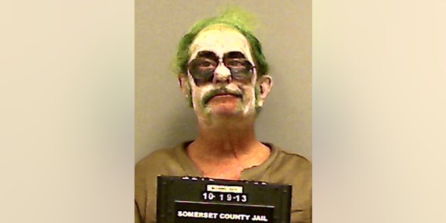 This booking photo provided by the Somerset County Sheriff’s Department shows Dennis Lalime, arrested Sunday, Oct. 20, 2013, when returning from a Halloween party made up as "The Joker," and charged with drunken driving after crashing his car in Pittsfield, Maine. (AP Photo/ Somerset County Sheriff’s Department)