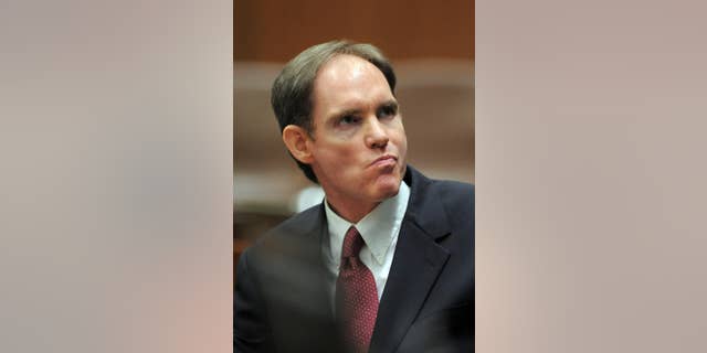 File-This July 27, 2009, file photo shows Cameron Brown at the Clara Shortridge Foltz Criminal Justice Center in Los Angeles.   Brown, 53, a former airline baggage handler,  was found guilty of hurling his daughter, Lauren Sarene Key, from Inspiration Point in Rancho Palos Verdes in November 2000 amid a bitter custody dispute with her mother. The first-degree murder conviction in May, 2015, came about a dozen years after Brown was arrested and followed two previous trials when jurors decided the death was a crime, but they couldn't agree whether it was murder or manslaughter. (Brad Graverson/The Daily Breeze via AP)