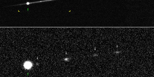 This image shows "active asteroid" P/2012 F5 in 2014. The lower image shows the fragments without the dust trail, for better visibility.