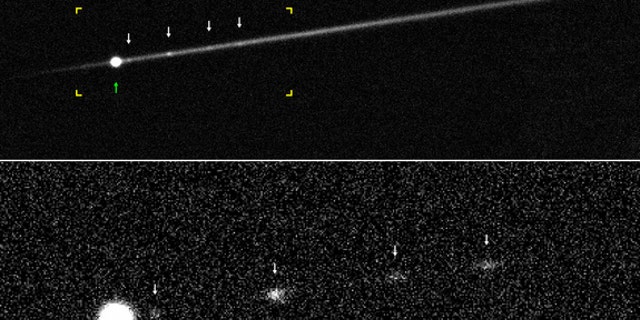 This image shows "active asteroid" P/2012 F5 in 2014. The lower image shows the fragments without the dust trail, for better visibility.
