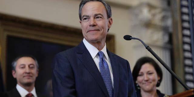 FILE - In this Jan. 10, 2017, file photo, Texas Speaker of the House Joe Straus, R-San Antonio, stands before the opening of the 85th Texas Legislative session in the house chambers at the Texas State Capitol in Austin, Texas. State-funded adoption agencies backing Texas legislation that would sanction the rejection of prospective parents on religious grounds already routinely deny non-Christian, gay, and unmarried applicants because they are wary of their beliefs or lifestyle. But now they also want legal cover in case of potential lawsuits. (AP Photo/Eric Gay, File)