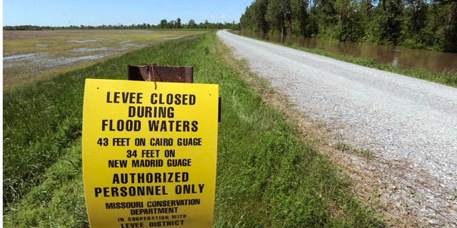 April 29: The Birds Point levee is seen with the New Madrid Floodway, at left, and the Mississippi River floodwaters, at right in Birds Point, Mo.