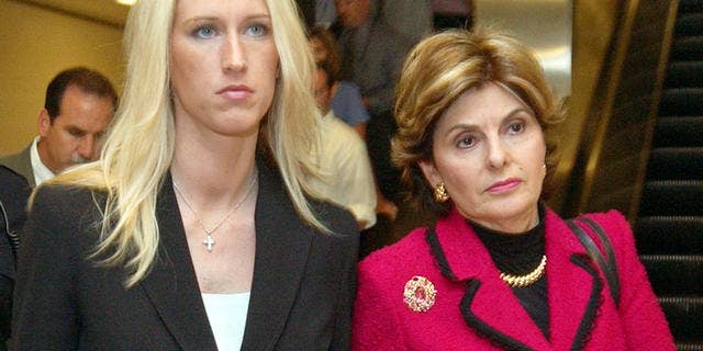 Amber Frey, left, leaves with her attorney Gloria Allred, right, after she testified during the Scott Peterson trial at the Redwood City, Calif., courthouse, Tuesday, Aug. 10, 2004.