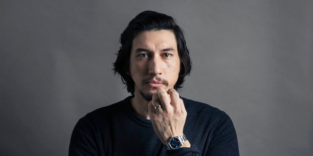 FILE - This Dec. 14, 2016 file photo shows actor Adam Driver posing for a portrait in New York. Driver, 34, reprises his role as the conflicted Kylo Ren in 