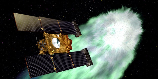 An artist envisions the approach of NASA's Stardust-NExT spacecraft at Comet Tempel 1 -- an encounter that took place on Valentine's Day (Feb. 14) in 2011.