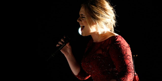 February 15, 2016. Singer Adele performs "All I Ask" on stage at the 58th Grammy Awards in Los Angeles, California.