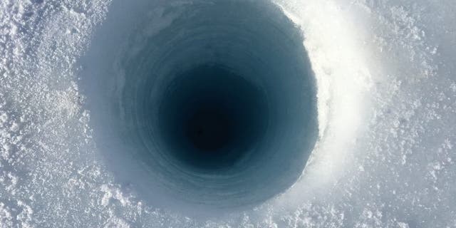 The expedition members hope to dive beneath the ice up to four times a day.