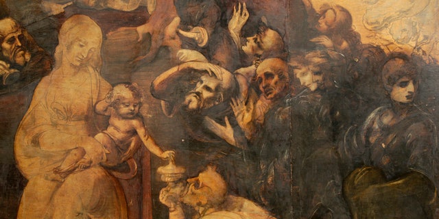 A close up shows details in the "Adoration of the Magi", a painting that Leonardo da Vinci started in 1481 at the age of 29 but abandoned a year later, as it is unveiled in Florence September 23, 2014.
