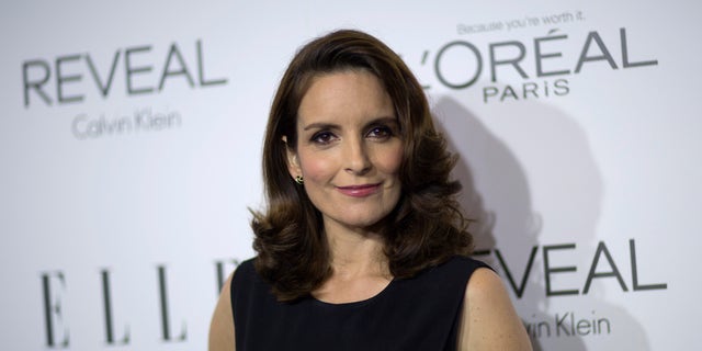 Tina Fey poses at the 21st annual ELLE Women in Hollywood Awards in Los Angeles on October 20, 2014.