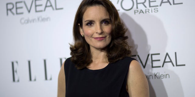 Tina Fey poses at the 21st annual ELLE Women in Hollywood Awards in Los Angeles on October 20, 2014.