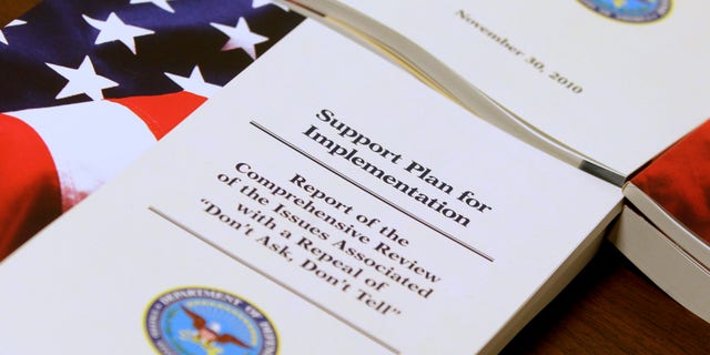 A report of a Pentagon survey on the issues associated with a repeal of "Don't Ask, Don't Tell" is seen on a table,at the Pentagon, Tuesday, Nov. 30, 2010, after Defense Secretary Robert Gates and Joint Chiefs Chairman Adm. Mike Mullen spoke to reporters on gays in the military. (AP Photo/Charles Dharapak)