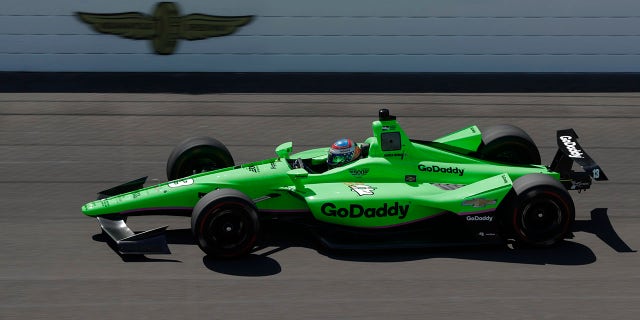 IndyCar driver Danica Patrick heads into the first turn as she taker her refresher test at the Indianapolis Motor Speedway in Indianapolis, Tuesday, May 1, 2018. (AP Photo/Michael Conroy)